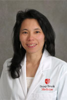 Photo of Yvonne Kwok, NP in white coat