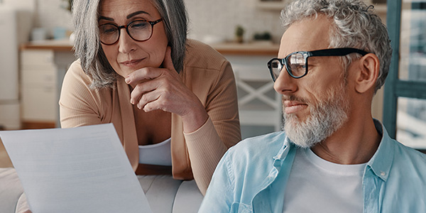 Couple looking at test results on a piece of paper