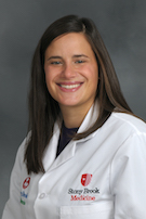 Photo of Dr. Rachel Davis in a white coat