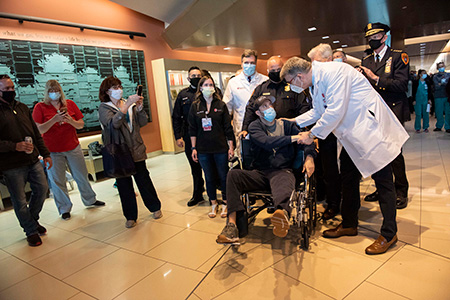 Officer Christopher Racioppo leaving Stony Brook University Hopsital