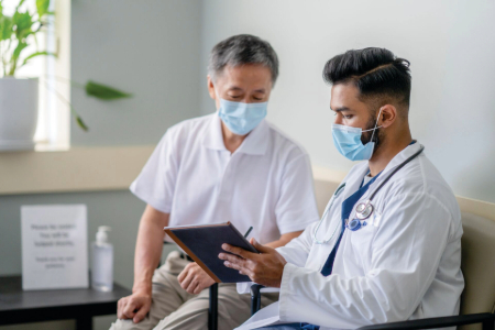 Doctor speaking with patient