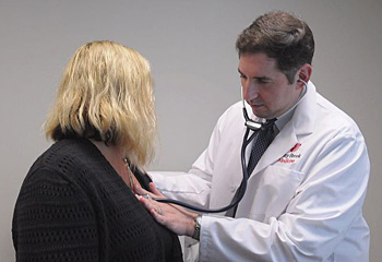 Dr. Cesa with patient