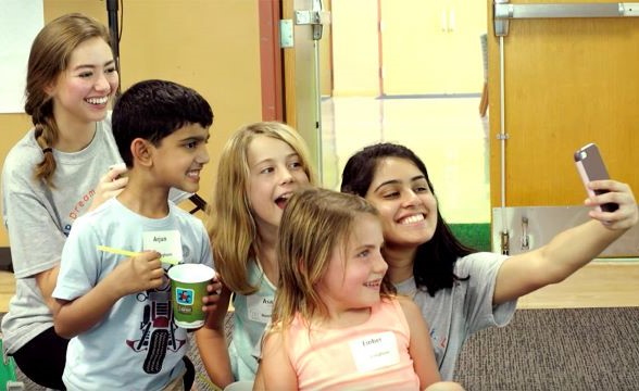 Children taking selfie