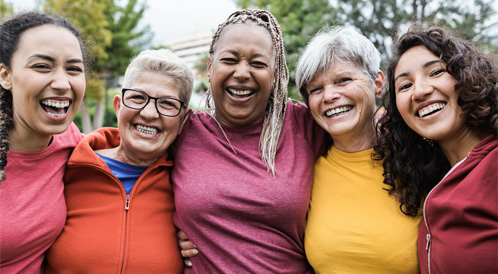 Happy multi generational women having fun together after sport workout outdoors