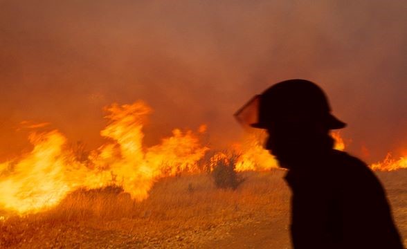 Fireman fighting fire